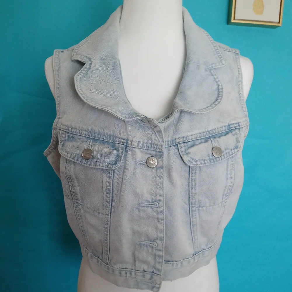 Vest L A . Blue  with a lace heart in the back  size  Large girls color light